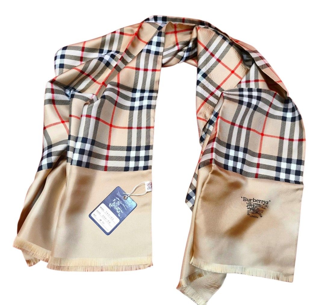 Vintage Burberry Long Scarf (Category: Luxury Accessories) located in Digos. Submitted by emmanuel28 (Listing ID 1462908124, Image 1). Description: Vintage Burberry Long Scarf 100% Silk material Bnew with tags Authentic Location: Davao del sur Buyer shoulders shipping fee.