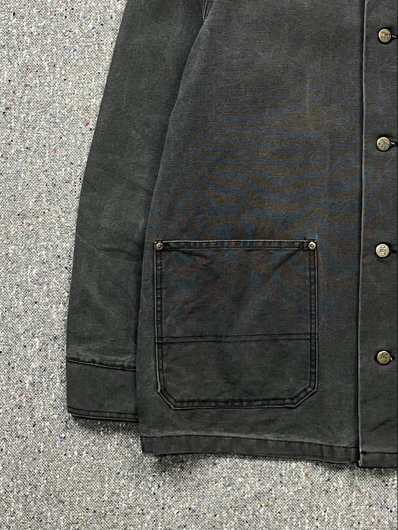 Vintage Caterpillar (CAT) washed black canvas chore jacket (Category: Activewear) located in Zamboanga. Submitted by deconstrukt.fit (Listing ID 1466329058, Image 3). Description: Caterpillar—primarily known as a heavy machinery manufacturer—has a long-running, highly durable work apparel line that has become a staple in vintage streetwear and heritage workwear subcultures. The jacket is made from a heavy-duty, tightly woven cotton duck canvas th