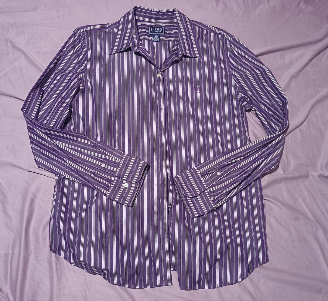 Vintage Chaps by Ralph Lauren Classics Purple Striped Button-Down Shirt (Category: Others Tops) located in San Juan City. Submitted by marie_d_r (Listing ID 1466251204, Image 2). Description: - Brand/Model: Chaps Classics button-down shirt - Color/Pattern: Purple with white vertical stripes - Size: XL - Material: 100% cotton (Made in Indonesia) - Features: Long sleeves with button cuffs, classic collar, single chest pocket, and branded buttons - 