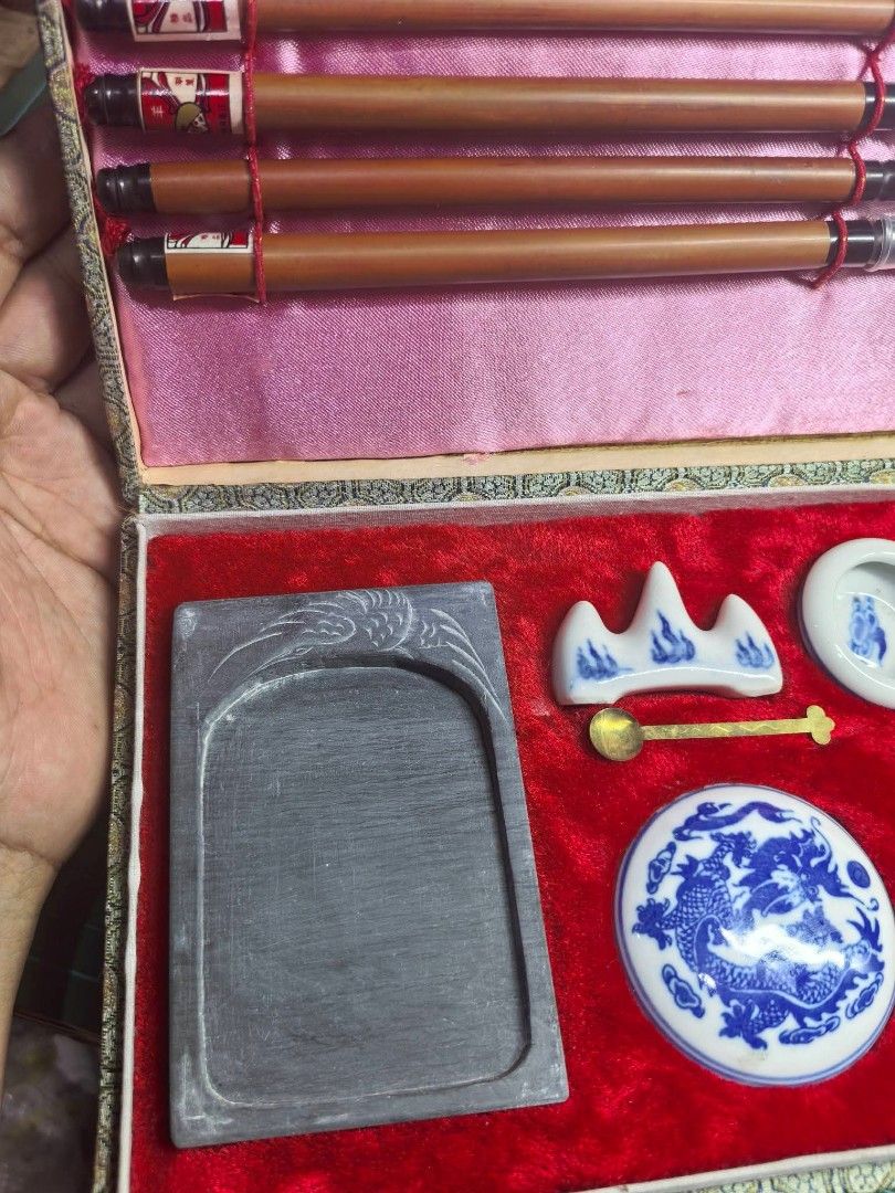 Vintage Chinese Calligraphy Set (Category: Craft Supplies & Tools) located in Cebu City. Submitted by dudes_villanueva (Listing ID 1466290026, Image 2). Description: Vintage Chinese Calligraphy Set Like New Condition 📌 Often called the Four Treasures of the Study, featuring four hair brushes, an ink stone, an ink stick with dragon motifs, a porcelain water coupe, a brush rest, and a soapstone seal stamp housed in a silk brocade presentation box.