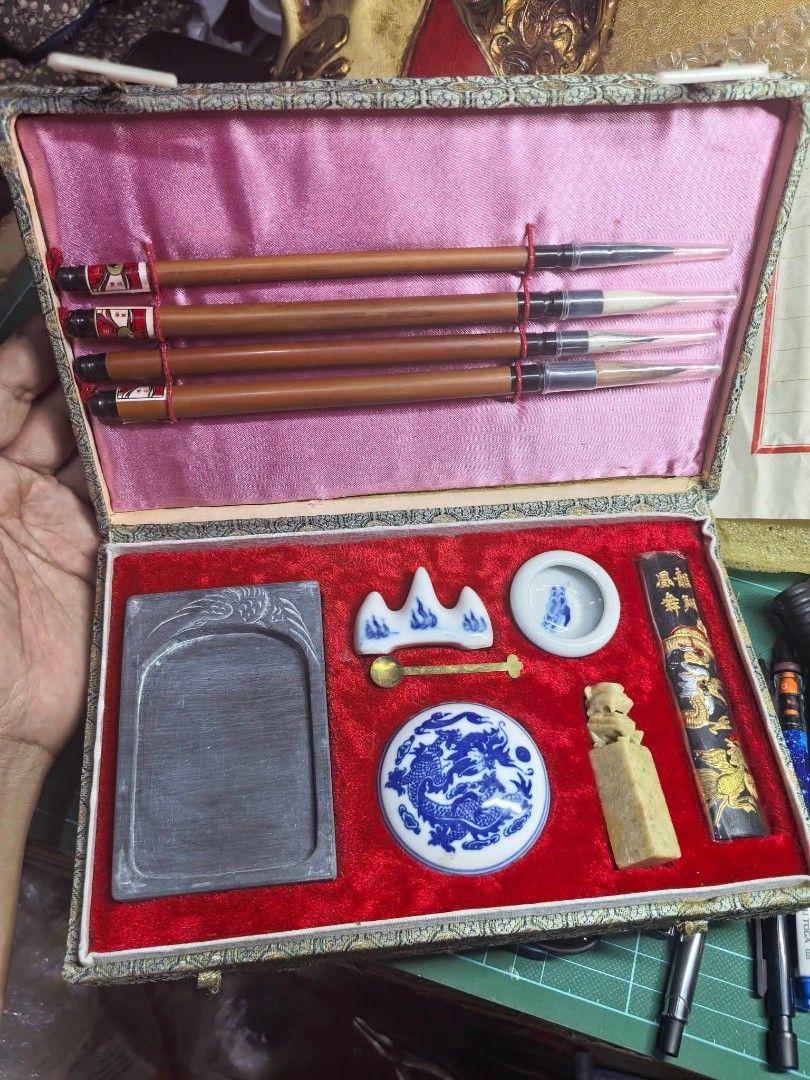 Vintage Chinese Calligraphy Set (Category: Craft Supplies & Tools) located in Cebu City. Submitted by dudes_villanueva (Listing ID 1466290026, Image 1). Description: Vintage Chinese Calligraphy Set Like New Condition 📌 Often called the Four Treasures of the Study, featuring four hair brushes, an ink stone, an ink stick with dragon motifs, a porcelain water coupe, a brush rest, and a soapstone seal stamp housed in a silk brocade presentation box.