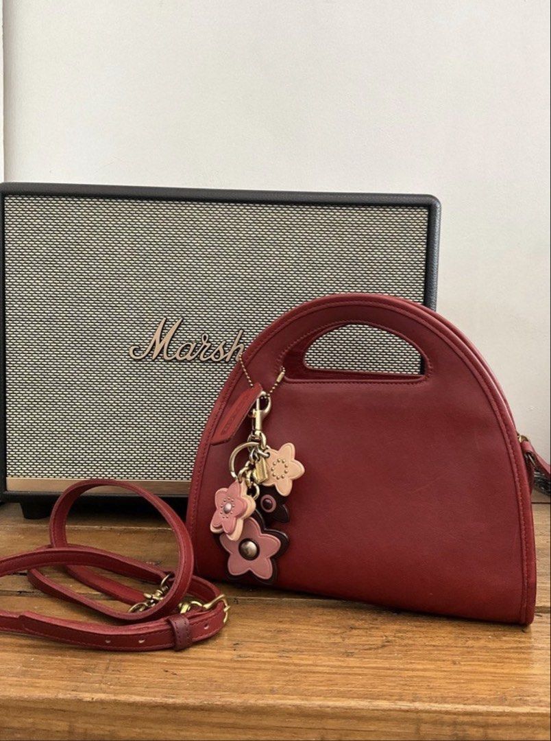 Vintage Coach Bag Carousel (Category: Luxury Bags & Wallets) located in Manila. Submitted by karendepan95717 (Listing ID 1466315748, Image 1). Description: - Brand: Coach - Material: Premium leather - Closure: Secure top zipper - Includes: Detachable shoulder strap, hanging leather tags, and original care booklet Excluded: floral charms.