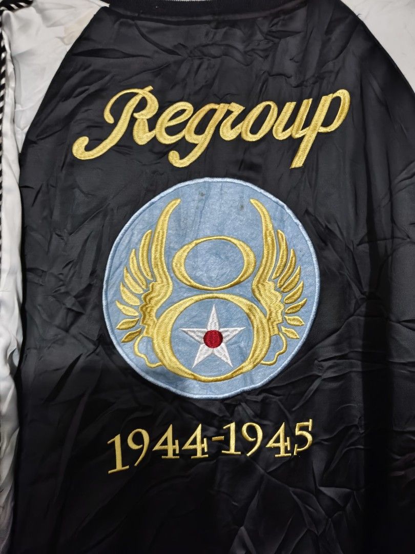 SUKAJAN Vintage Flying Tigers Regroup Mighty Eighth Reversible Bomber Jacket (Category: Coats, Jackets and Outerwear) located in Baguio. Submitted by fordaluvofthrift2600 (Listing ID 1466168343, Image 3). Description: vintage flying tigers Reversible bomber jacket with military-themed embroidery. One side features blue quilted satin with Flying Tigers patches and flags. Reverse side has black and white striped details, Mighty Eighth graphics, and