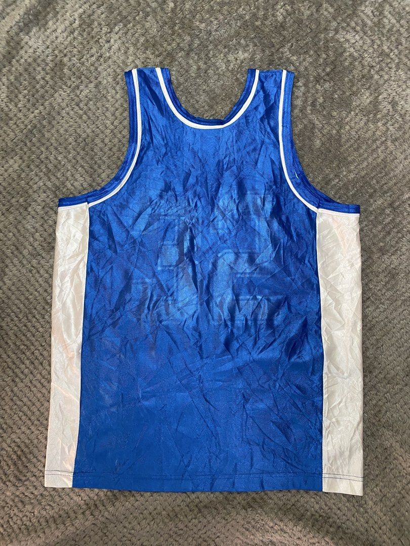Vintage Nike tank top (Category: Activewear) located in Prosperidad. Submitted by octaviorey80594 (Listing ID 1466311042, Image 3). Description: Dimes 20x28 Issue faded number 32 9.5/10 color rate.
