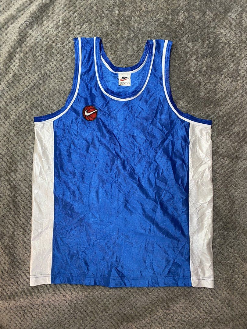 Vintage Nike tank top (Category: Activewear) located in Prosperidad. Submitted by octaviorey80594 (Listing ID 1466311042, Image 1). Description: Dimes 20x28 Issue faded number 32 9.5/10 color rate.