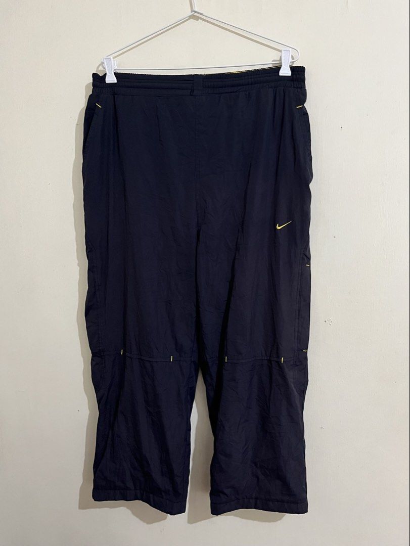 Vintage Nike Track Pants (Category: Swim Trunks & Board Shorts) located in Manila. Submitted by oloip.thrift (Listing ID 1466312006, Image 1). Description: Dimes: 32/38 Leg opening: 9.5 Issue: medyo fade (washable) Good condition Color rate: 8/10.