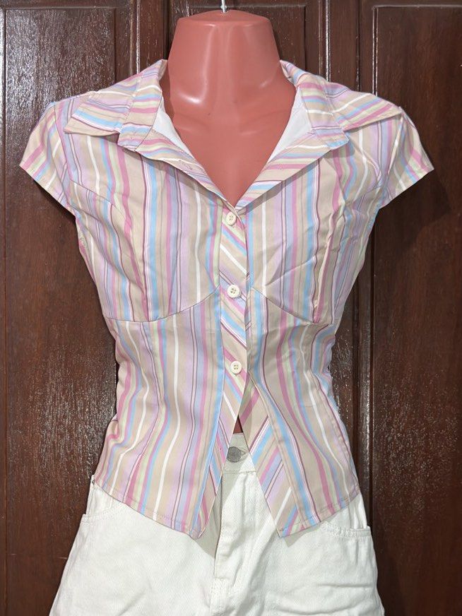 vintage striped short sleeve button-down polo blouse (Category: Blouses) located in Muntinlupa City. Submitted by aldscart (Listing ID 1466175926, Image 1). Description: • pre-loved 💌 • price is negotiable! • mop: bank transfer; mod: sdd, ggx send me a msg for inquiries! .