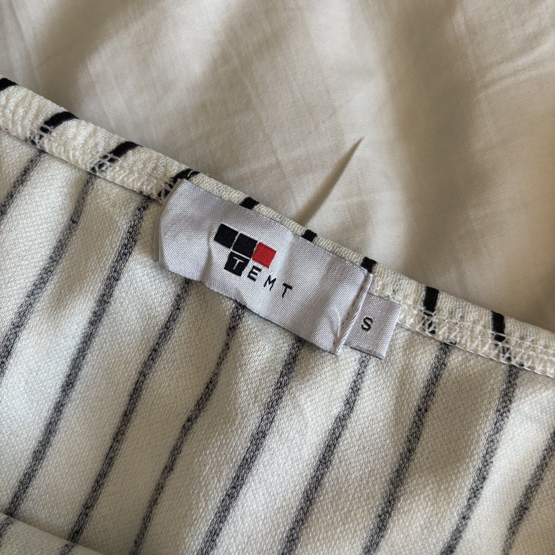 Vintage White Stripe Off Shoulder Bodysuit (Category: Sleeveless) located in Binan City. Submitted by myprelovedhaul (Listing ID 1466202959, Image 2). Description: - fits xs to medium! - no when worn photos! - last price posted! - please message only if sure buyer! - limited replies only. - Available unless mark as sold. - Ship via j&t or lalamove for same day. -Mode of payment: Gcash 📍Biñan Laguna .