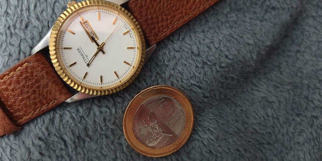 Vintage Wittnauer ( Sapphire Crystal) (Category: Men's Watches) located in Cebu City. Submitted by aceoftime (Listing ID 1466309527, Image 3). Description: In good working condition Swiss Made Swiss analog quartz w/ day-date display Stainless steel with gold plated fluted bezel Classic minimalist design Watch only Our Guarantee: 💯 Authentic All watches are checked by our experienced technician to ensure good functionality Please manage your expe