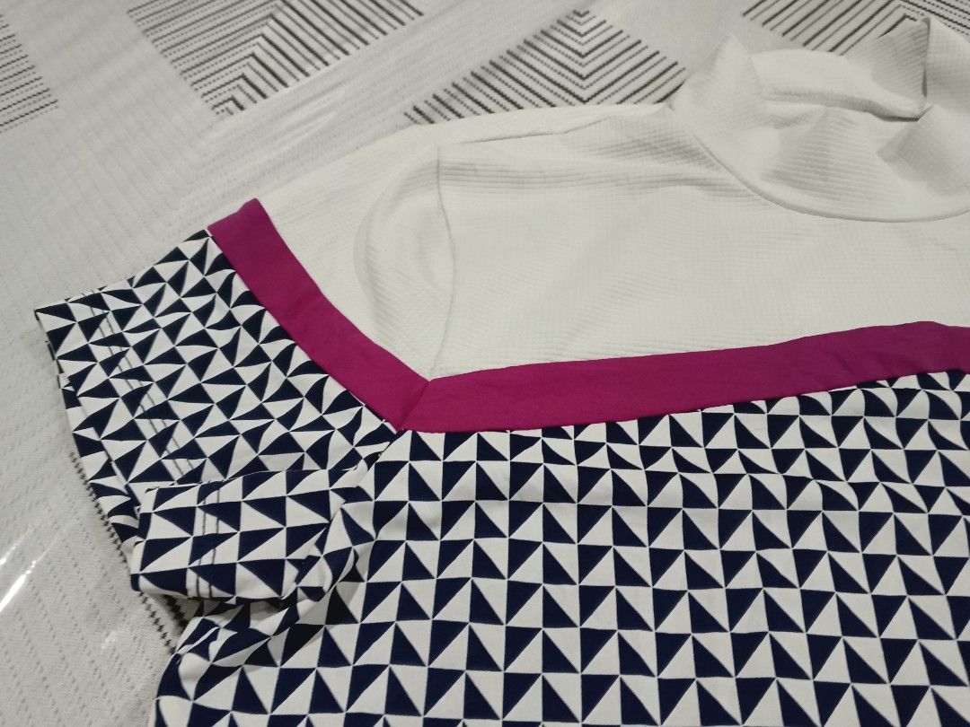 W Angle Golf Top + 84 SF (Category: Activewear) located in Cebu City. Submitted by OneStop_ThriftShop_Mo (Listing ID 1466321617, Image 3). Description: W Angle ⛳🏌️💓 Premium Quality Nice color combination and design Dri-fit, malambot na madulas tela nito Neatly stitched Size95 on tag W 17.5" L 24".