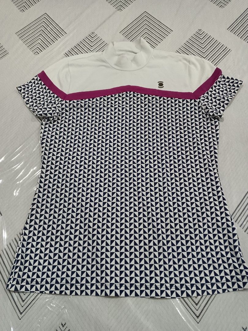 W Angle Golf Top + 84 SF (Category: Activewear) located in Cebu City. Submitted by OneStop_ThriftShop_Mo (Listing ID 1466321617, Image 1). Description: W Angle ⛳🏌️💓 Premium Quality Nice color combination and design Dri-fit, malambot na madulas tela nito Neatly stitched Size95 on tag W 17.5" L 24".