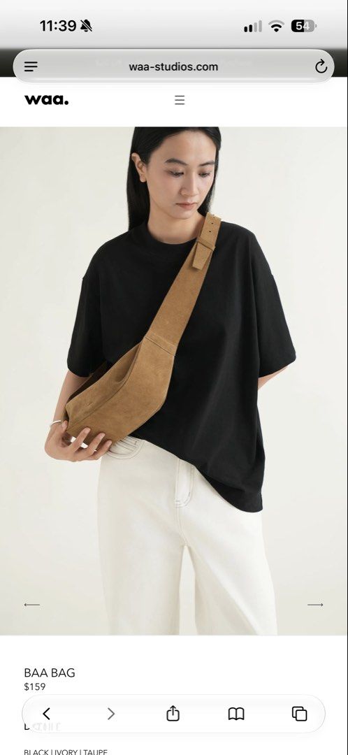 Waa Studios Baa Bag in Taupe Suede (Category: Cross-body Bags) located in Paranaque City. Submitted by izdeclutters (Listing ID 1466180520, Image 2). Description: TAUPE COCOA WASHED | SUEDE Shell: Cowhide Suede, Lining: 100% Cotton Concealed metal zip closure Adjustable strap length: 85-100 cm Height: 11 cm, Width: 29.5 cm, Depth: 10 cm Original price 159 USD .