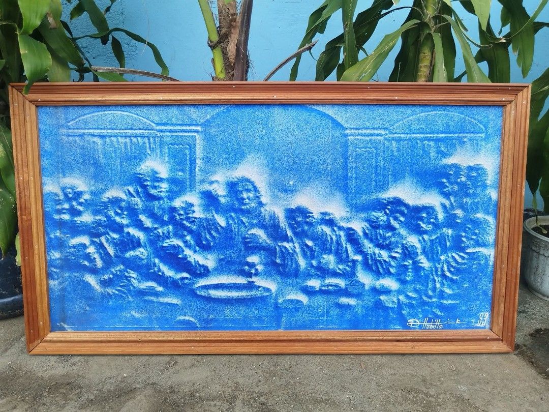 Wall Art (Category: Other Home Furniture) located in Meycauayan. Submitted by marygracecasimiro (Listing ID 1466191802, Image 3). Description: Textured Blue Bas-Relief wall art piece depicting Leonardo da Vinci's The Last Supper in excellent condition, signed by D Hubila dated 1993. Framed and ready to used. Get it for only P3,500 🩷 Size L38 x H21 inches.