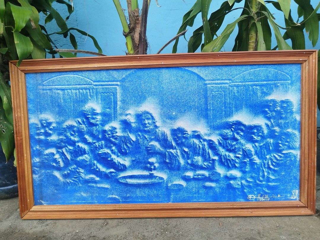 Wall Art (Category: Other Home Furniture) located in Meycauayan. Submitted by marygracecasimiro (Listing ID 1466191802, Image 1). Description: Textured Blue Bas-Relief wall art piece depicting Leonardo da Vinci's The Last Supper in excellent condition, signed by D Hubila dated 1993. Framed and ready to used. Get it for only P3,500 🩷 Size L38 x H21 inches.