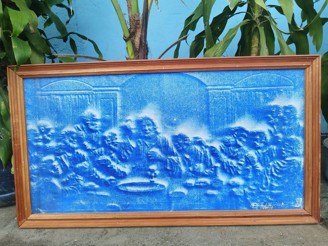 Wall Art (Category: Other Home Furniture) located in Meycauayan. Submitted by marygracecasimiro (Listing ID 1466191802, Image 2). Description: Textured Blue Bas-Relief wall art piece depicting Leonardo da Vinci's The Last Supper in excellent condition, signed by D Hubila dated 1993. Framed and ready to used. Get it for only P3,500 🩷 Size L38 x H21 inches.