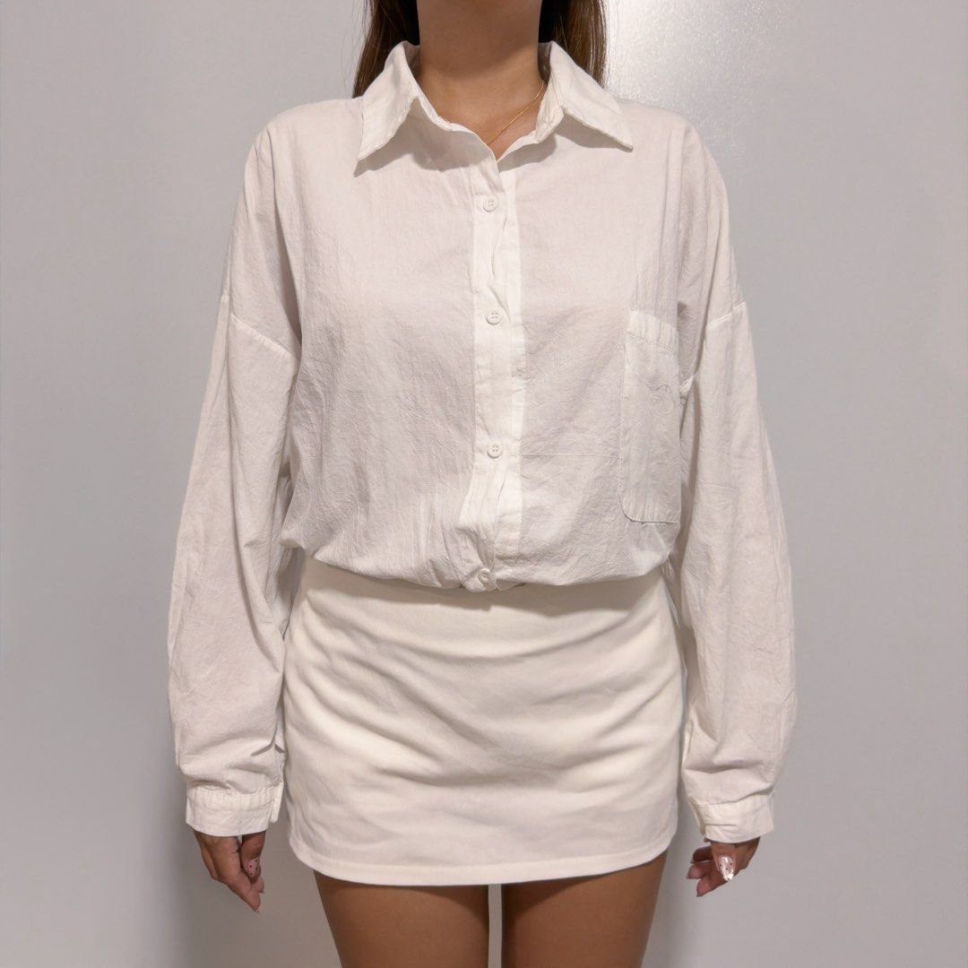 white button down top (Category: Longsleeves) located in Cebu City. Submitted by cuteoncue (Listing ID 1466328111, Image 1). Description: large-xxl please see last photos for washable stains. the item was freshly laundered but not soaked or stain-treated..