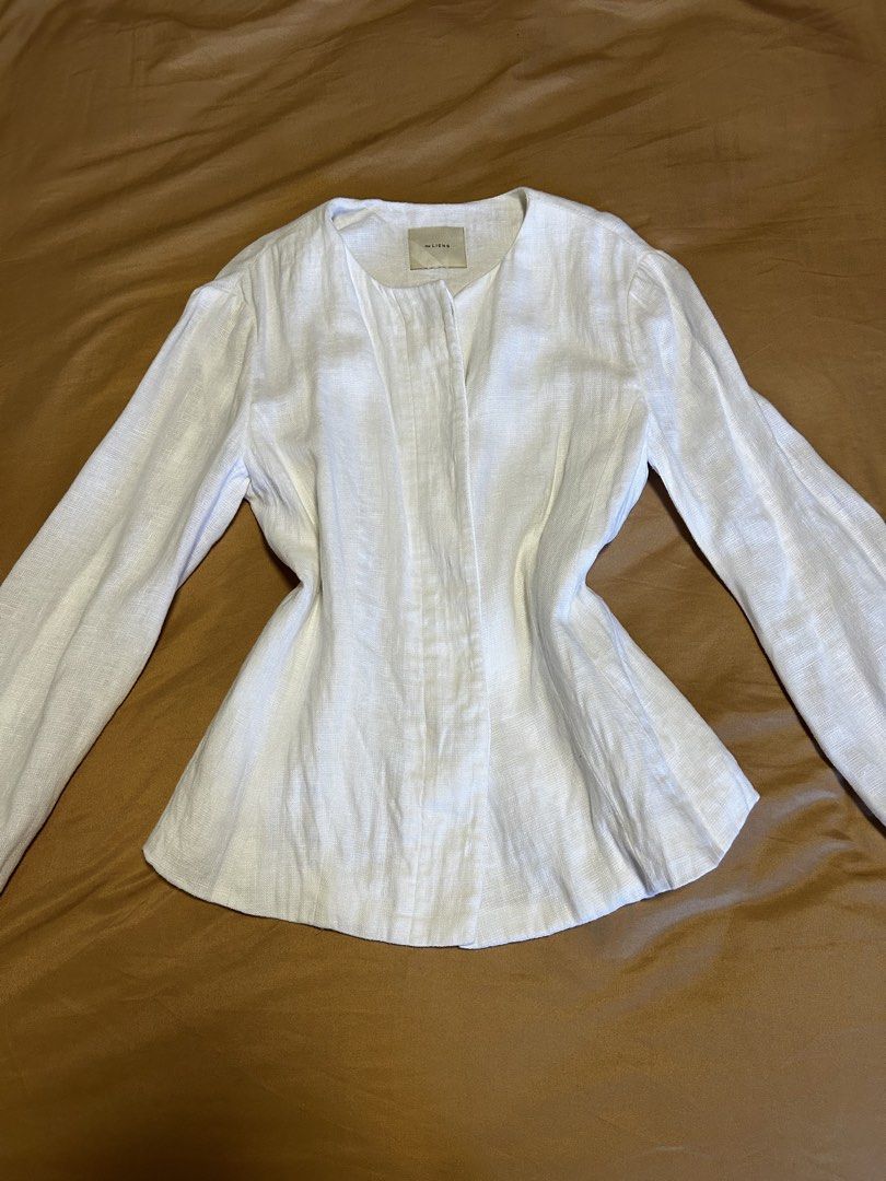 White Linen Coat Long Sleeves (Category: Longsleeves) located in Taguig. Submitted by my.serendipithrift (Listing ID 1466206429, Image 2). Description: Size: XS-M Working buttons Hidden buttons Double lining at the front A bit sheer at the back Washed and ready to wear.