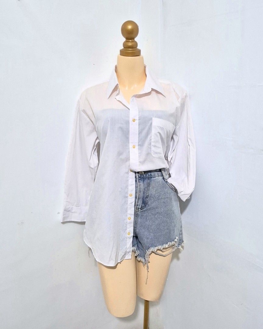 White Oversized Button Down Shirt | Long Sleeve Blouse | L-XL (Category: Longsleeves) located in Cabanatuan. Submitted by _erboutique (Listing ID 1466329623, Image 3). Description: • Classic white collared shirt • Gold-tone buttons, chest pocket • Semi-sheer lightweight fabric • Loose relaxed fit | Size L–XL • Bust 48" | Shoulder 19" | Length 24" • Casual office everyday wear • Excellent preowned condition.