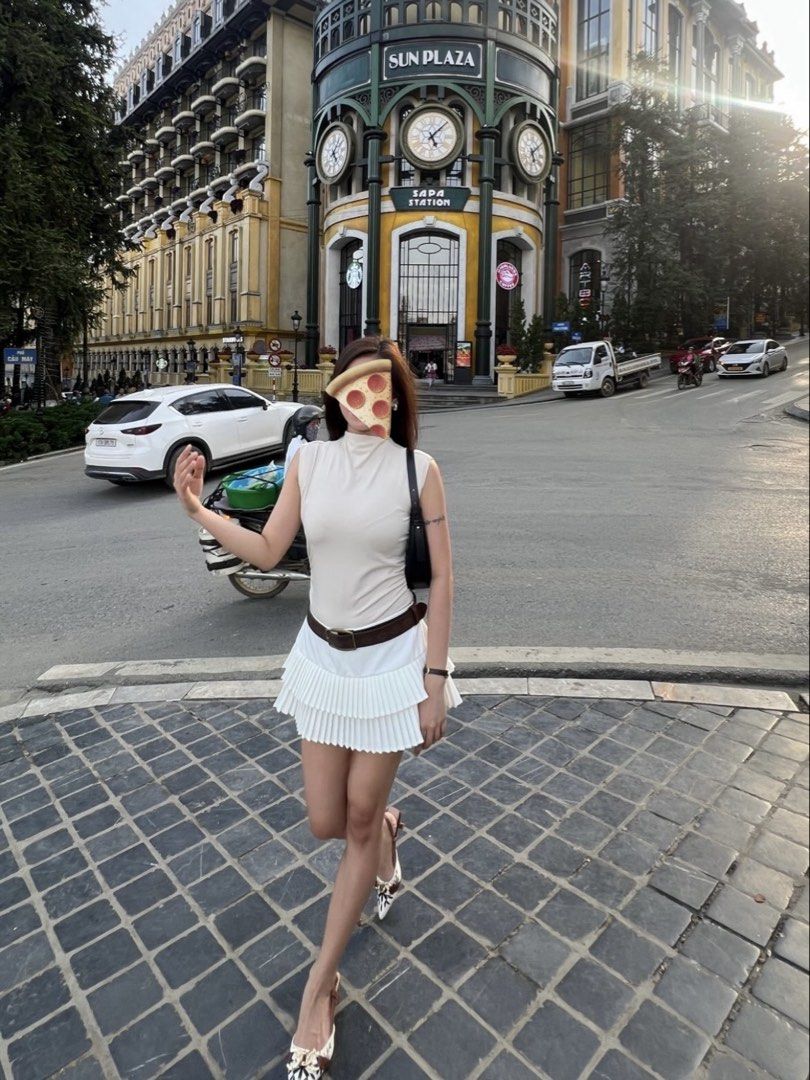 white pleated mini skirt (Category: Skirts) located in Paranaque City. Submitted by janicesab (Listing ID 1466327669, Image 2). Description: only worn once second slide is actual pic with built-in shorts.