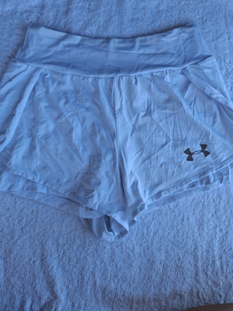 UNDER ARMOUR FLY BY 2-IN-1 WHITE SHORT (Category: Activewear) located in Abucay. Submitted by petiteprettyboutiquev2 (Listing ID 1466171808, Image 1). Description: color rate white na white ito.. L in size but fits well to M Goods for running or pickleball with inner kasi and flowy + SF(J&T) Disclaimer : need wash may mga washable stains na stock din kasi ng matagal.