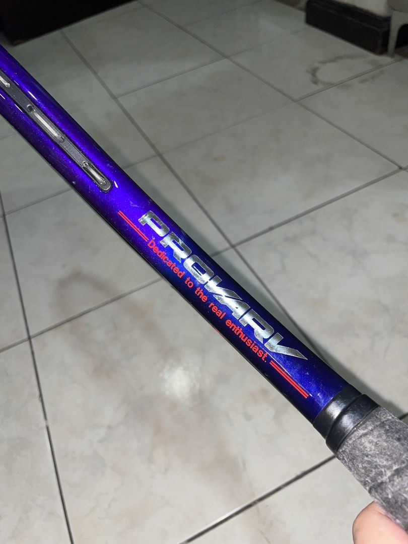 Winghart PROVARV Tennis Racket Japan (Category: Racket and Ball Sports) located in Del Monte. Submitted by aleckpo (Listing ID 1466187511, Image 2). Description: - Brand/Model: Winghart Provarv Tennis Racket - Design & Origin: Designed in Japan, Manufactured in Thailand - Color/Finish: Eye-catching blue sparkle finish - Specs: Recommended tension 50-55 lbs - Condition: Strung and ready to hit the court, wrapped with a brand-new black grip tape - 