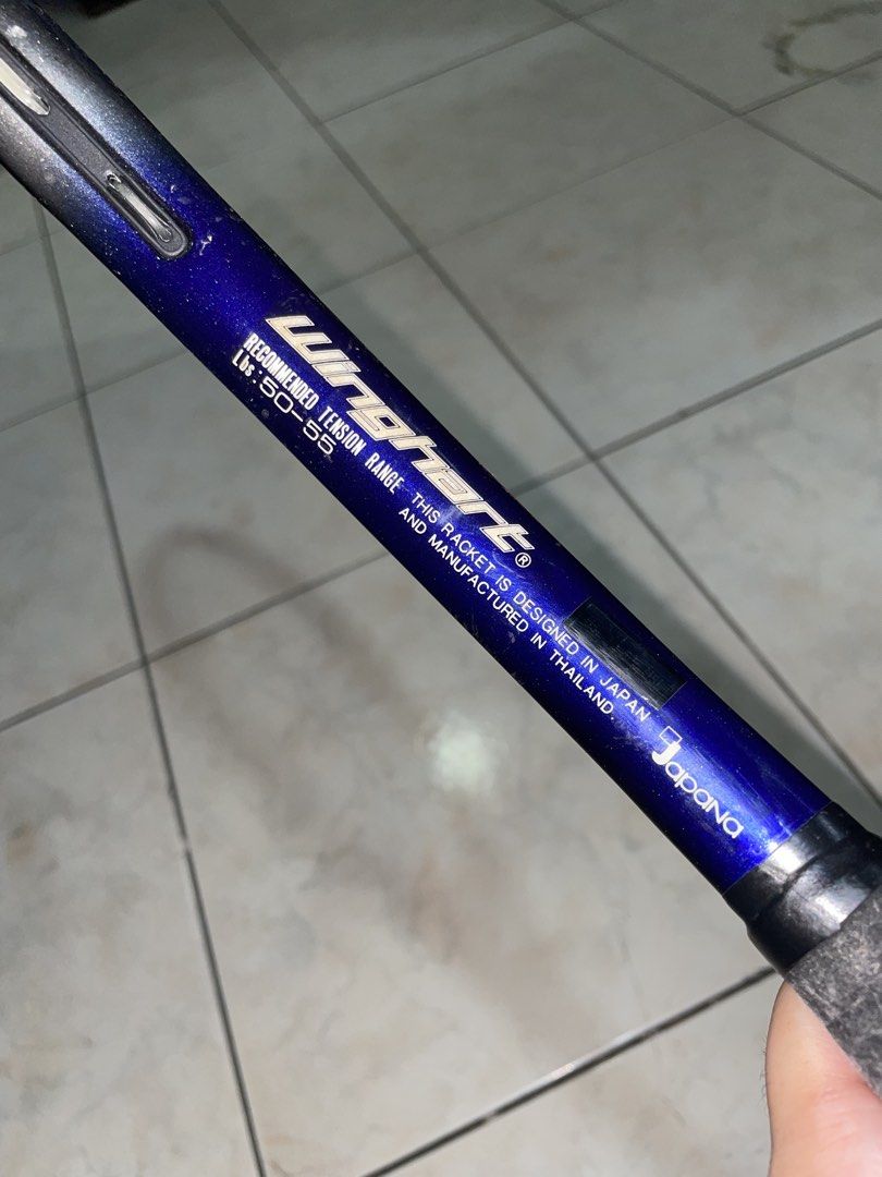 Winghart PROVARV Tennis Racket Japan (Category: Racket and Ball Sports) located in Del Monte. Submitted by aleckpo (Listing ID 1466187511, Image 3). Description: - Brand/Model: Winghart Provarv Tennis Racket - Design & Origin: Designed in Japan, Manufactured in Thailand - Color/Finish: Eye-catching blue sparkle finish - Specs: Recommended tension 50-55 lbs - Condition: Strung and ready to hit the court, wrapped with a brand-new black grip tape - 