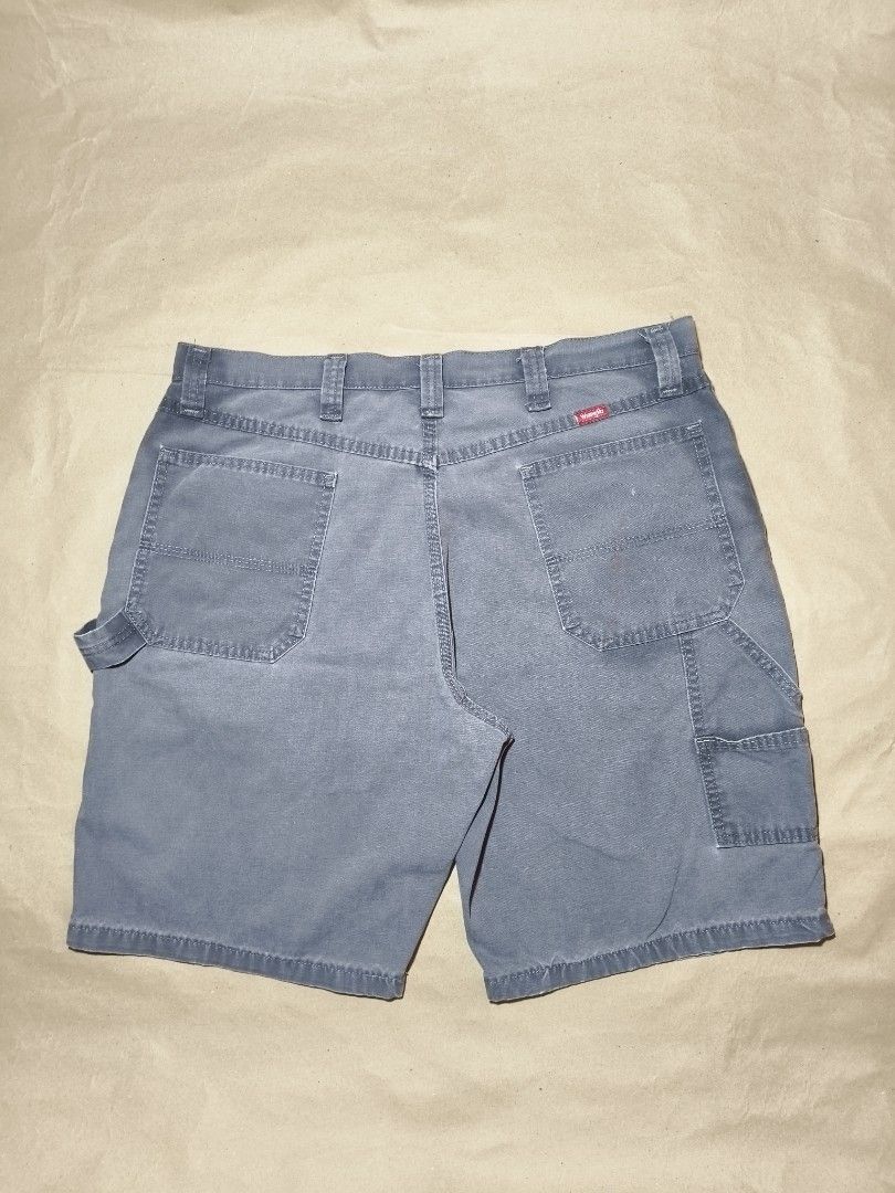 Wrangler Carpenter Denim Shorts Gray (Category: Shorts) located in Manila. Submitted by thriftclothin (Listing ID 1466302029, Image 2). Description: Wrangler carpenter shorts in a washed gray color. Classic utility style with side tool pockets and hammer loop. Button closure with zip fly. Regular fit through the waist and thighs. Back patch pockets with Wrangler logo tag..