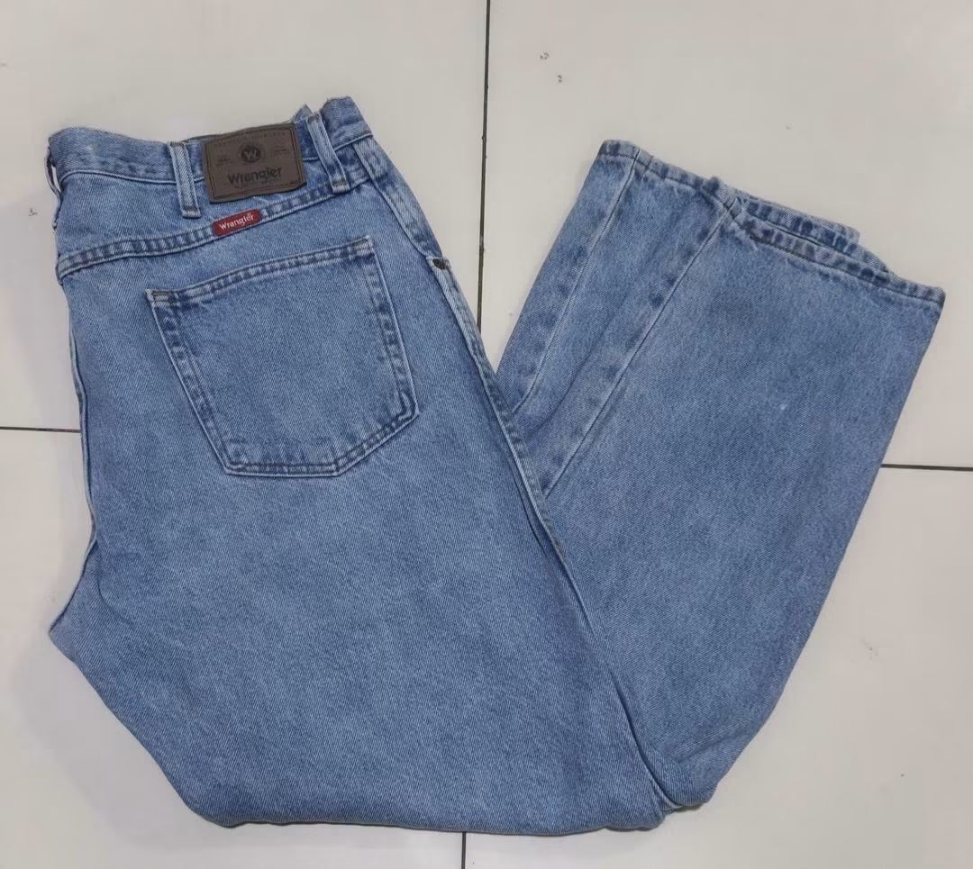 Wrangler Regular Fit Denim Jeans Size 36x30 (Category: Jeans) located in San Carlos City. Submitted by dhong_abay_thrift (Listing ID 1466226487, Image 1). Description: - Brand: Wrangler - Style: Regular fit, straight leg denim jeans - Wash: Light blue - Size: 36" waist / 30" inseam - Material: 100% cotton - Details: Classic 5-pocket design, rear patch pockets, leather waistband patch - Origin: Made in Nicaragua - Condition: Excellent / Ready to w