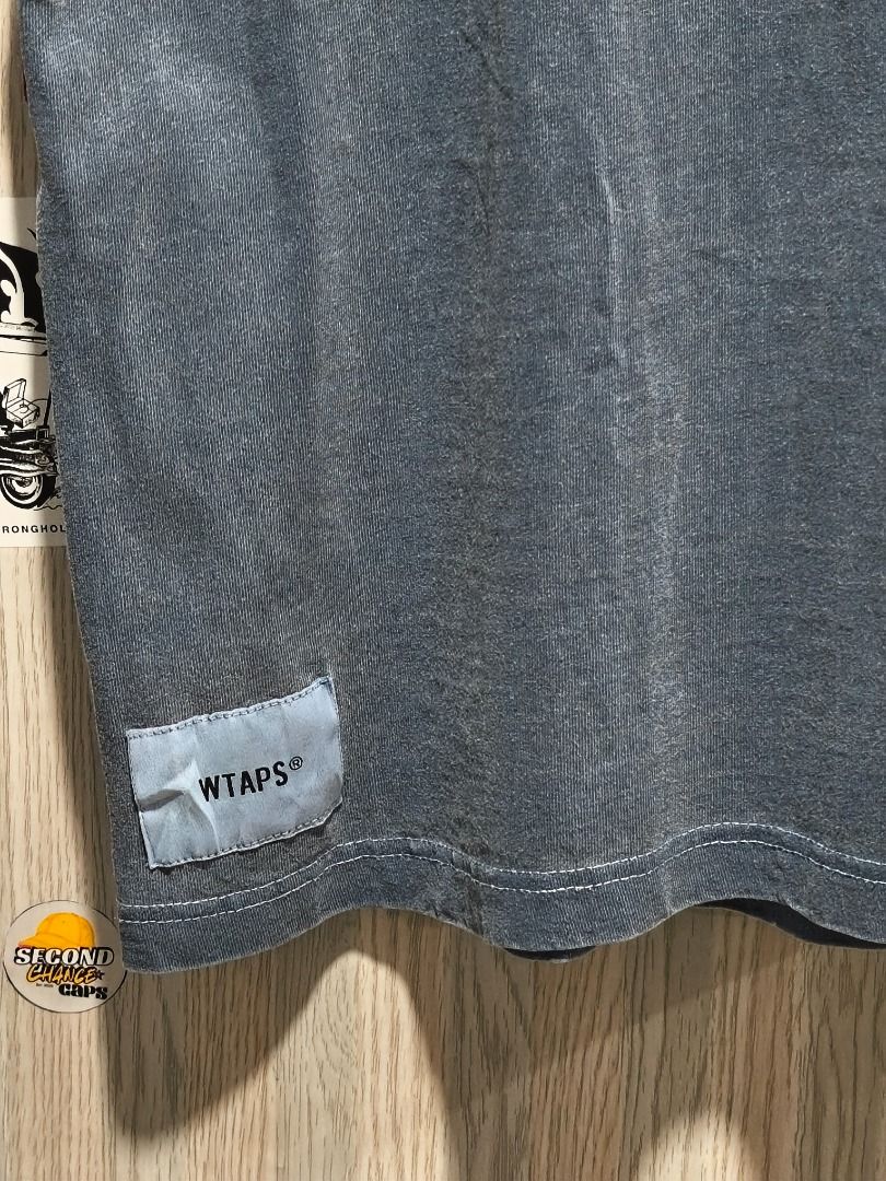 WTAPS Pocket T-Shirt (Category: Tshirts & Polo Shirts ) located in Davao. Submitted by thethriftproject082 (Listing ID 1466302774, Image 3). Description: WTAPS Pocket Tee 📍𝐌𝐈𝐍𝐄: 450 📍𝐒𝐈𝐙𝐄 𝐎𝐍 𝐓𝐀𝐆: 2XL 📍𝐃𝐈𝐌𝐄𝐒: 30 x 24 - Brand: WTAPS - Color: Washed Grey (faded vintage look) - Fit: Relaxed fit - Details: Crew neck, short sleeves, chest pocket with branding label, woven logo tag at the hem - Condition: Brand new / Excellent quali
