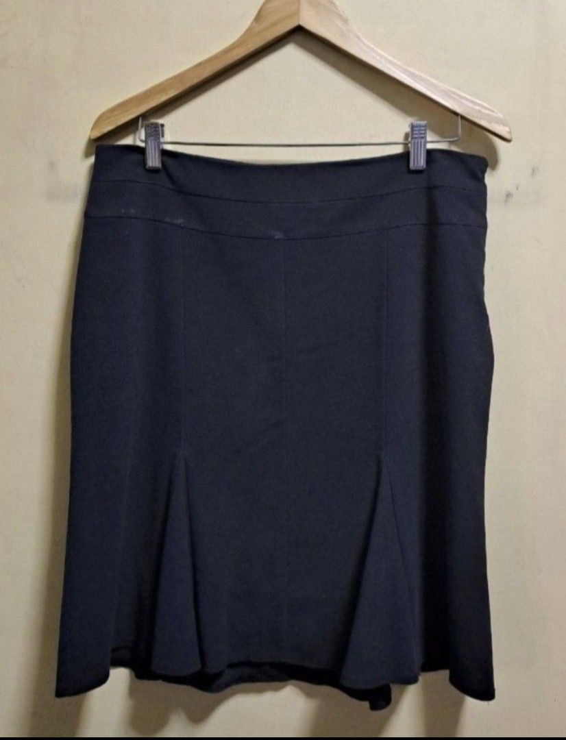 XOXO Black Pleated Skirt (Category: Skirts) located in Manila. Submitted by thrifter_lifestyle (Listing ID 1466178597, Image 1). Description: Brand: XOXO (bought in the US) Falls below the Knee- Length All Black with pleats Zipper enclosure on the side Has printed silk lining inside (see photo) Waist: 34" No issues 😀 RFS: Shifted to WFH, no need for office/business clothes.