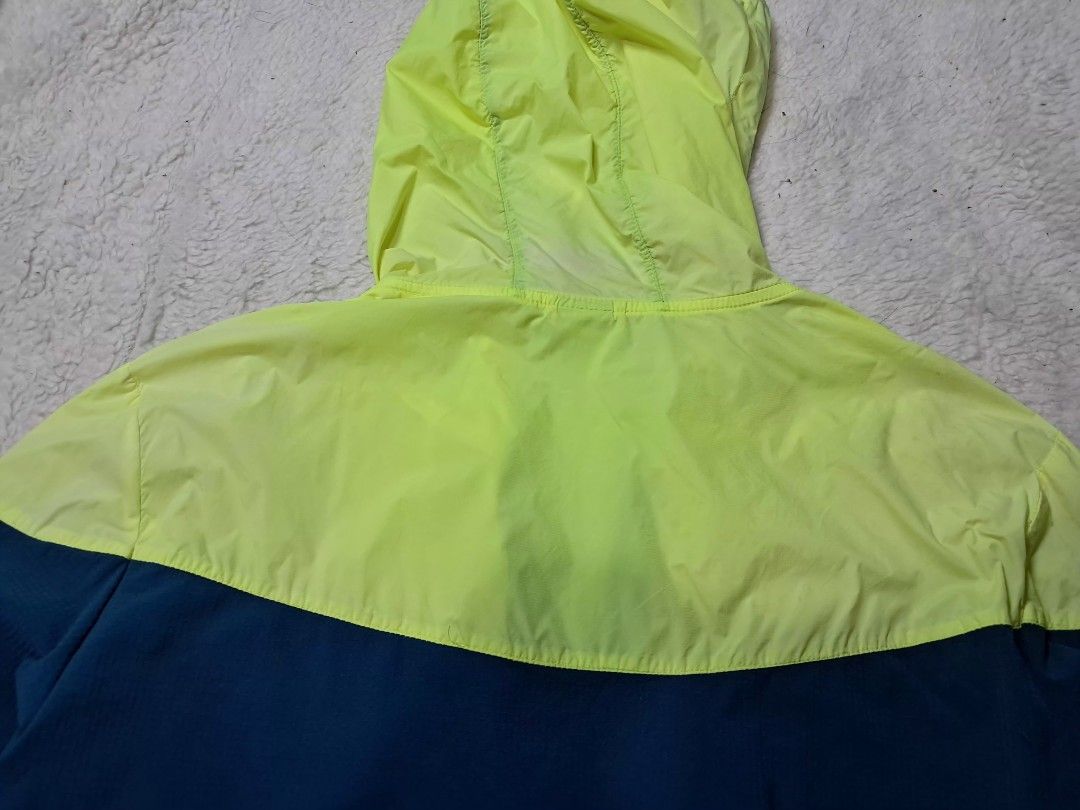 Xtep run train windbreaker jacket (Category: Coats, Jackets and Outerwear) located in Baguio. Submitted by mishmashfritz (Listing ID 1466163422, Image 3). Description: Good used condition, min. Lints/fabric snag, nylon lime green part, polyester fabric green part, zippered pockets thrifted, slight discoloration on hood and back- unnoticeable Washable stain malapit sa logo.
