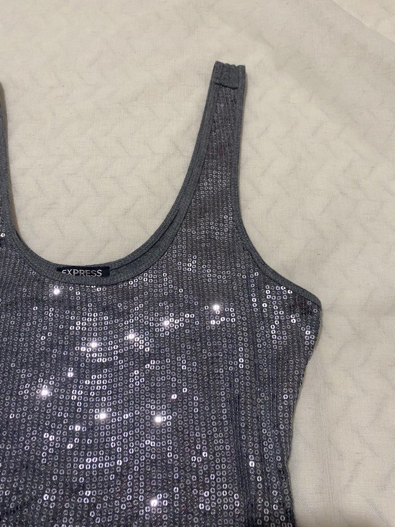 Y2k Express Sexy Basic Sequin Tank Top (Category: Sleeveless) located in Marilao. Submitted by kyssmarila (Listing ID 1466306292, Image 3). Description: — Size: M (stretchy) — Color: Silver colorway — Complete sequin — Flaws: None — Issue: None.