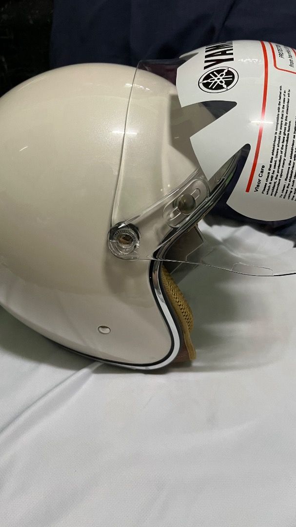 Yamaha Classic Retro Open Face Helmet (Category: Helmets and other Riding Gears) located in Caloocan City. Submitted by schiraaa (Listing ID 1466257646, Image 2). Description: - Brand: Yamaha Classic Retro Open Face Helmet - Color: Cream / Off-white with glossy finish - Size: XL - Includes: Clear protective visor - Design: Vintage open-face style, ideal for scooter and classic motorcycle riders.