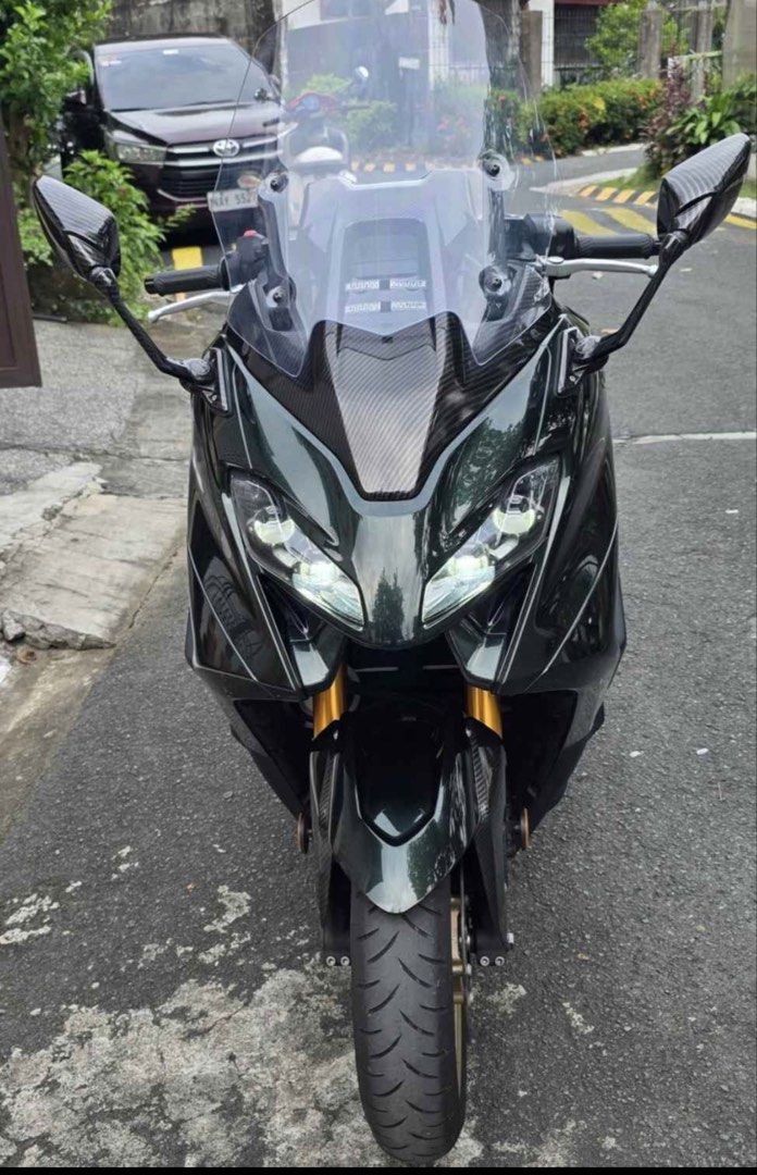 Yamaha TMAX Maxi Scooter (Category: Motorbikes for Sale) located in Manila. Submitted by ajoybally (Listing ID 1466181974, Image 3). Description: YAMAHA TECH MAX 560cc ( TMAX ) - Top of the Line - Year Model 2023 - Complete Legal Documents - LTO Plate Number - Registered Until 2027 - Registered Under My Name - All Stock Engine - New Change Oil - Mileage: ODO 5k - Electrically Adjustable Windshield - Heated Rider Seat - Heated Rider Grips - Cruise