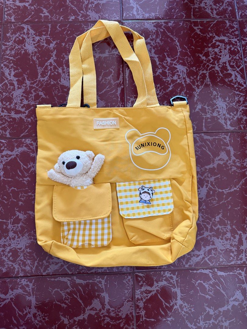 Yellow sling bag for kids (Category: Other Babies Going Out Needs) located in Las Pinas. Submitted by piwiealcantara (Listing ID 1466181043, Image 1). Description: .