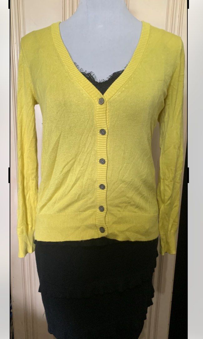 Yellow V-Neck Button-Up Cardigan (Category: Coats, Jackets and Outerwear) located in Quezon City. Submitted by clothingline4sale (Listing ID 1466157899, Image 1). Description: Yellow Button Down Cardigan Very good condition/ like new Soft fabric/ not itchy/ stretchable Size: medium Bust: 38-44” ; Length: 23” ; Arms Circumference: 14-18” Very nice in actual .