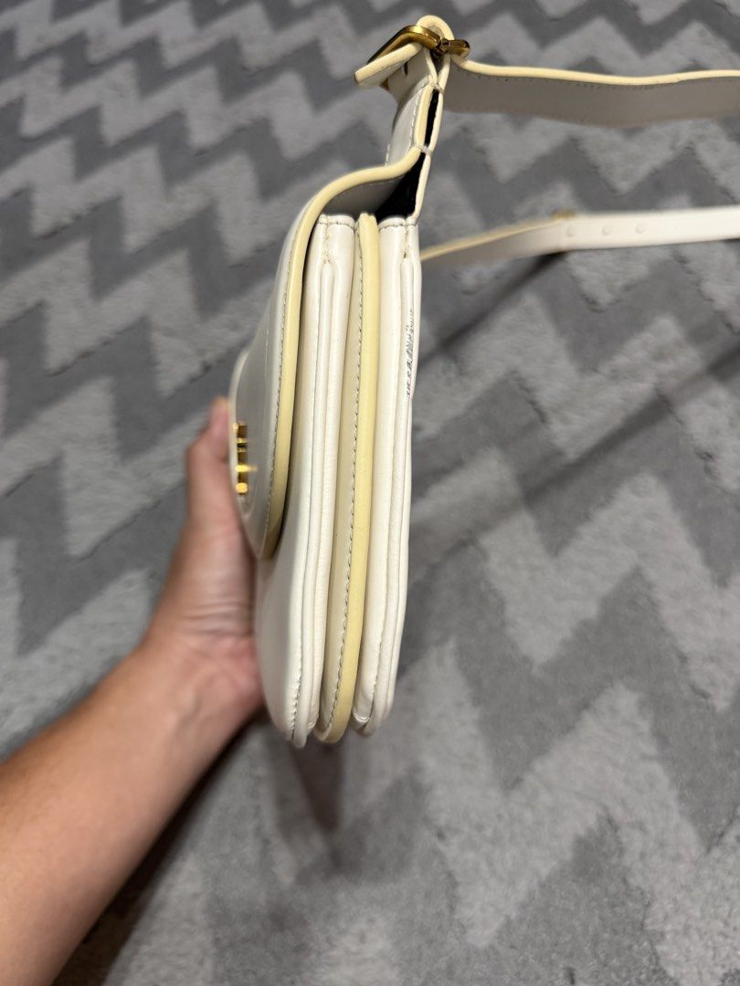 YSL - Ivory White Voltaire Bag (Category: Cross-body Bags) located in Cavite. Submitted by commoncourtesy (Listing ID 1466218052, Image 3). Description: No dust bag Very presentable Minor sign of usage.