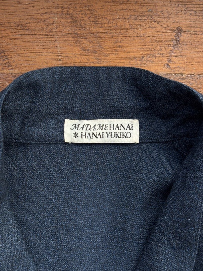Yukiko Hanai Navy Wool Wrap Kimono Style Jacket (Category: Coats, Jackets and Outerwear) located in Paranaque City. Submitted by grailonious (Listing ID 1466288390, Image 3). Description: All measurements posted 8/10 super clean condition, but has tiny pinholes that aren’t noticeable Madame Hanai Yukiko wrap jacket in dark navy blue. Shawl collar neckline with long sleeves and light shoulder padding. Wrap front design secures with a side tie thro