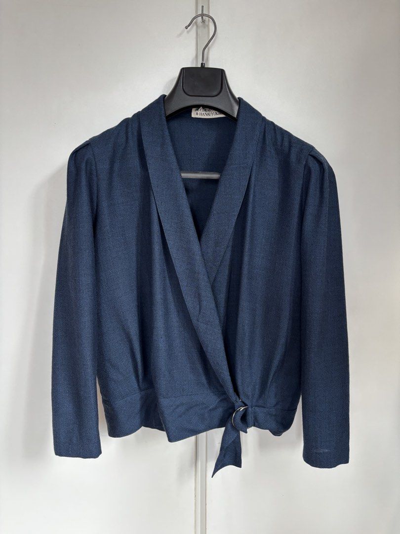 Yukiko Hanai Navy Wool Wrap Kimono Style Jacket (Category: Coats, Jackets and Outerwear) located in Paranaque City. Submitted by grailonious (Listing ID 1466288390, Image 1). Description: All measurements posted 8/10 super clean condition, but has tiny pinholes that aren’t noticeable Madame Hanai Yukiko wrap jacket in dark navy blue. Shawl collar neckline with long sleeves and light shoulder padding. Wrap front design secures with a side tie thro