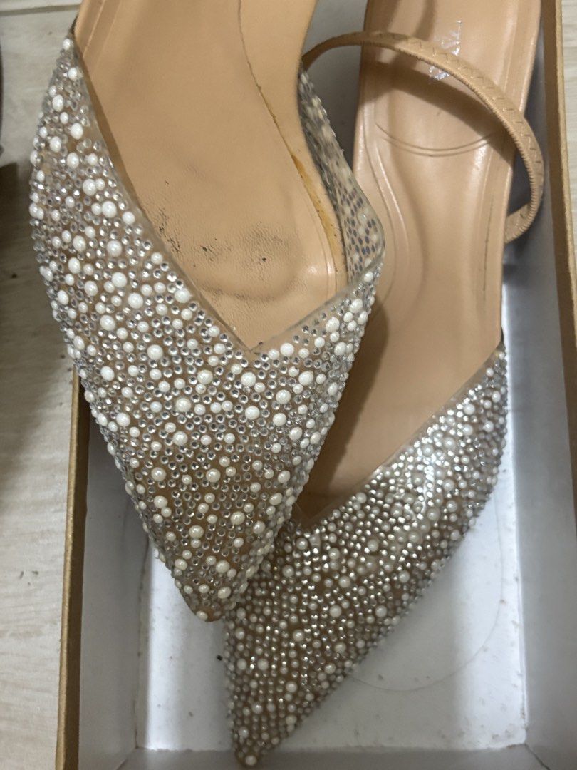 Zara Beaded Slingback Heels (Category: Heels) located in Mandaluyong City. Submitted by shopwithjuu (Listing ID 1466199769, Image 3). Description: Gorgeous Zara pearl and crystal slingback heels in nude, size as marked. Pointy toe design with comfortable elastic stretch strap. Comes with original box. Shows minor inner sole scuffs from gentle use, but still stunning on feet!.