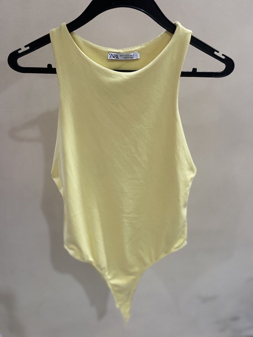 Zara Bodysuit (Category: Others Tops) located in Minglanilla. Submitted by mi_jin (Listing ID 1466179561, Image 1). Description: Zara “Yellow” sleeveless halter-neck bodysuit.