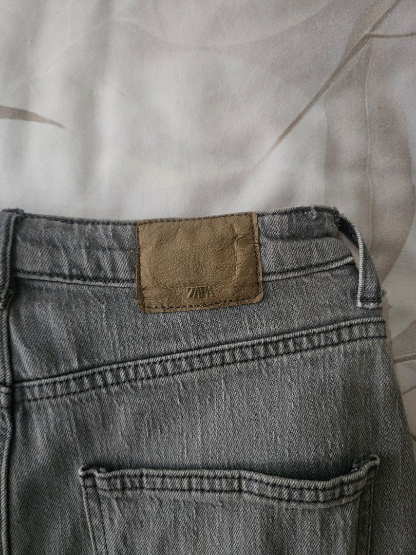 Zara Denim Midi Skirt (Category: Skirts) located in Muntinlupa City. Submitted by theasells (Listing ID 1466156907, Image 2). Description: Grey Zara denim midi skirt in a washed finish. Features a front slit. High-quality and thick material! Only used once.