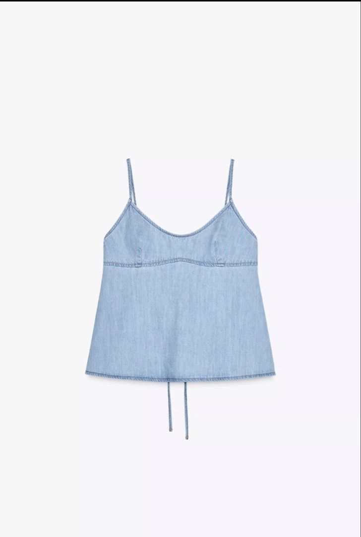 ZARA Denim top (Category: Sleeveless) located in Cebu City. Submitted by jennydin (Listing ID 1466288747, Image 1). Description: Light wash denim cami top Adjustable crisscross straps at the back, sweetheart neckline Never been used just removed tag :) RFS: not my style Size: M Org price: 1999.
