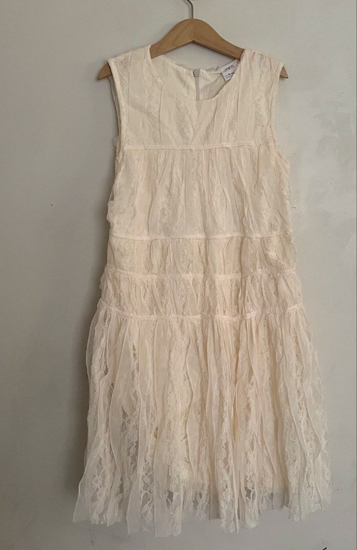 Zara gathered lace dress (Category: Babies & Kids Fashion) located in Manila. Submitted by ourburstingwardrobe_ (Listing ID 1466190180, Image 1). Description: Size 13-14 (runs small) Like new Ivory color Perfect for parties.
