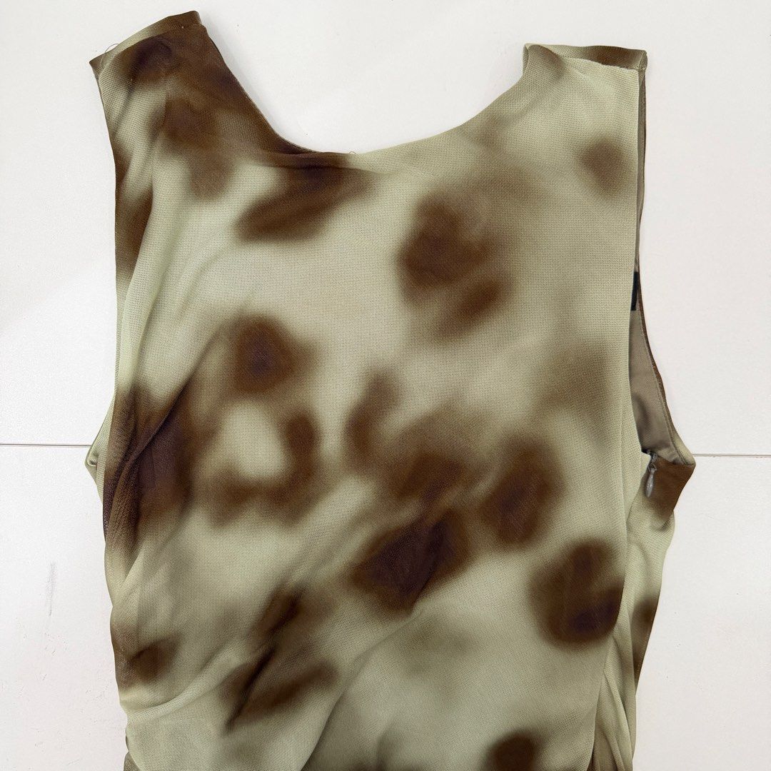 Zara Mesh Tie-Dye Midi Dress (Category: Dresses) located in Pasig City. Submitted by boymom20 (Listing ID 1466201412, Image 3). Description: - Brand: Zara - Style: Mesh midi dress with scoop neckline and sleeveless cut - Print: All-over brown and beige tie-dye - Features: Sheer mesh outer layer with full inner lining, and side zipper closure - Condition: Brand new with tag still attached LAST PRICE POSTED + 75 SHIPPING FEE VIA J&T.