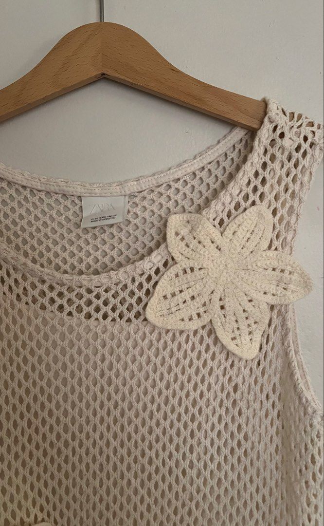 Zara open knit crochet top (Category: Babies & Kids Fashion) located in Manila. Submitted by ourburstingwardrobe_ (Listing ID 1466190320, Image 2). Description: Size 13-14 runs small In great condition.