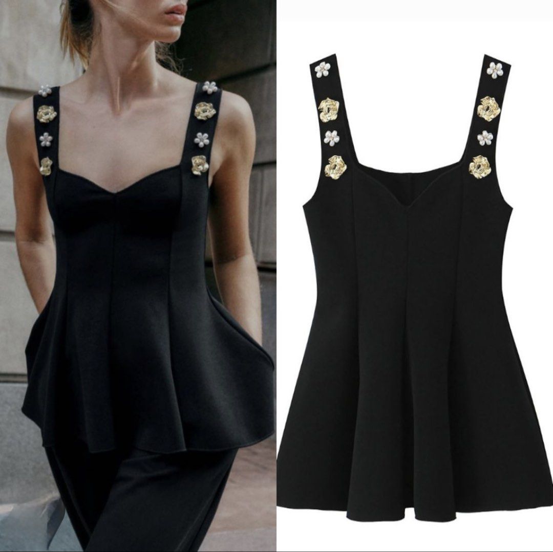 Zara Peplum Stretch Top (Category: Sleeveless) located in Mabalacat. Submitted by mommycris31 (Listing ID 1466171542, Image 1). Description: Peplum Stretch Top, a black sleeveless top featuring a sweetheart neckline and decorative floral and pearl-like embellishments along the straps..
