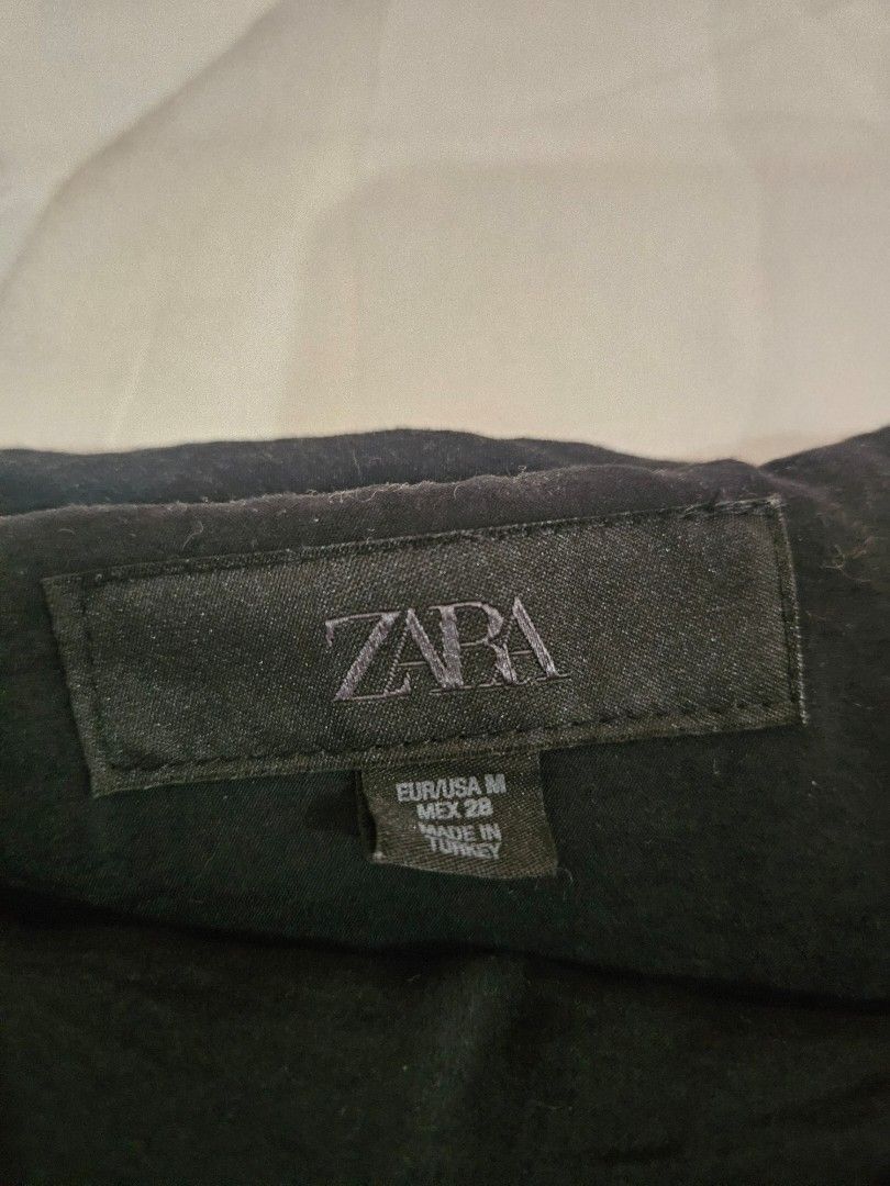 Zara Ruffled Mini Skort (Category: Skirts) located in Muntinlupa City. Submitted by theasells (Listing ID 1466156480, Image 2). Description: Black ruffled skort from Zara. Size M but fits semi S - M. Has built in shorts Super cute, only used twice!.