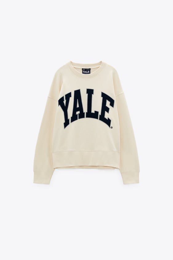 Zara Sweatshirt (Category: Coats, Jackets and Outerwear) located in Manila. Submitted by she_alice (Listing ID 1466325211, Image 3). Description: - Brand: Zara - Style: Off-white crewneck sweatshirt with navy blue Yale - Size: S - Material: Comfortable cotton blend - Details: Ribbed collar, cuffs, and hem - Flaw: minor stain at the back -Super pretty in actual. 💬 Feel free to message me for any questions 🛵 Can be shipped via Lalamove .