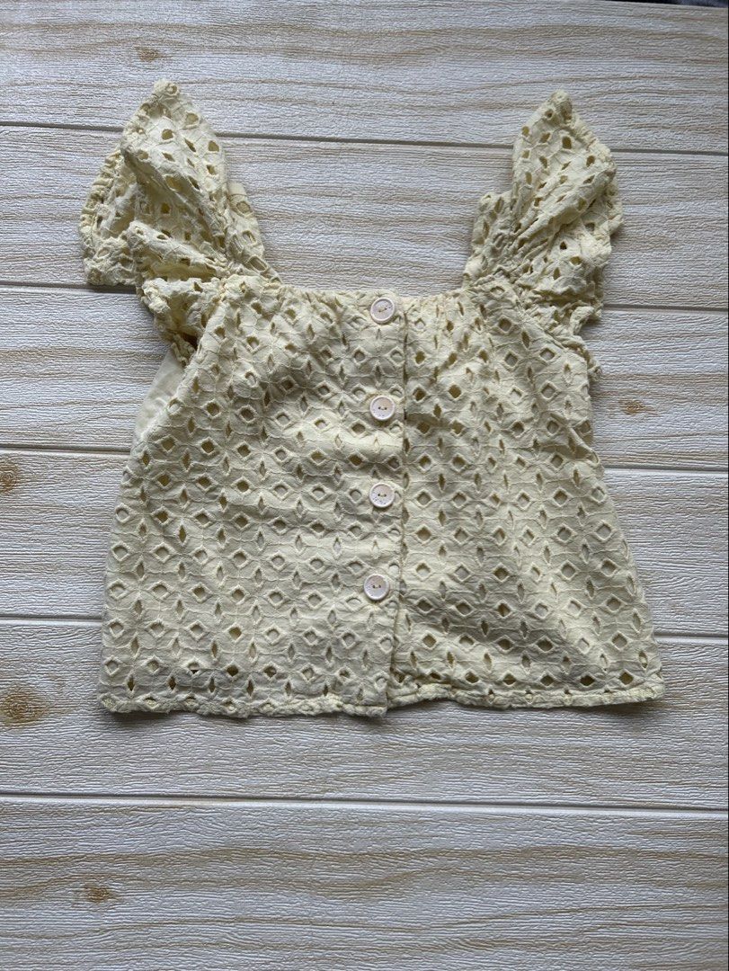 Zara top 6T (Category: Babies & Kids Fashion) located in Cebu City. Submitted by yjainani (Listing ID 1466170316, Image 1). Description: light yellow embroidered top from Zara featuring charming ruffled flutter sleeves and a square neckline.